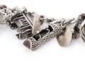 Curb Link Charm Bracelet With Assorted Sterling And Silverplate Charms, Some Loose