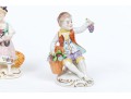 Four Continental Hand-painted Porcelain Figures