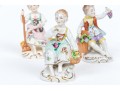 Four Continental Hand-painted Porcelain Figures