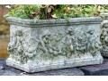 Pair Of Cast Stone Putti Motif Planters