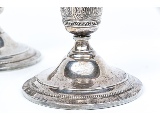 Pair Of Wedgwood International Sterling Silver Weighted Candlesticks