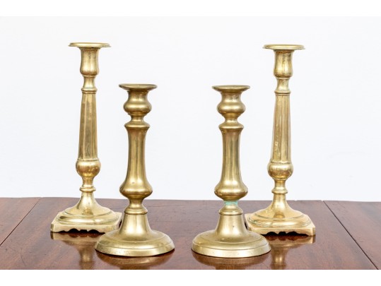 Four 19th C. Brass Candlesticks