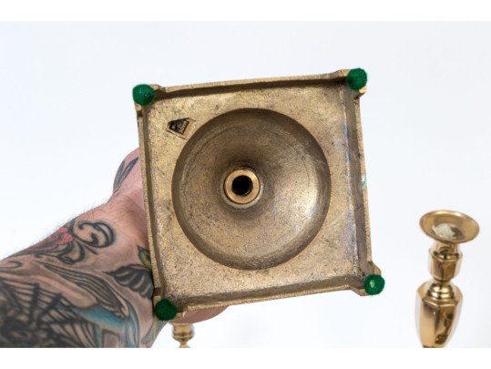 Assembled Collection Of Ten Brass Candlesticks And Candles