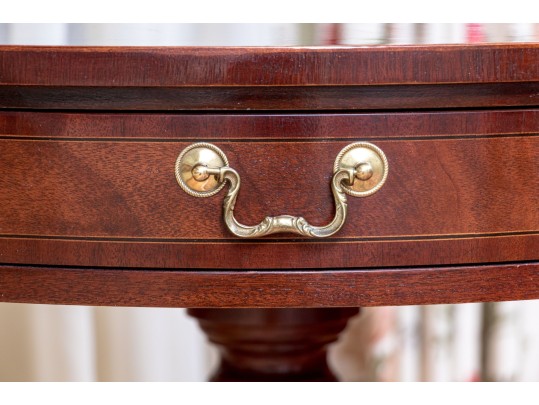 Baker Furniture Banded Flame Mahogany Pedestal Drum Table