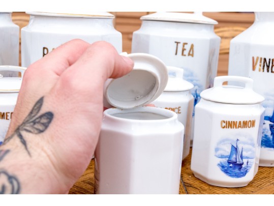 Collection Of Nine German Lidded Blue And White And Gilt Finished Ceramic Storage Vessels