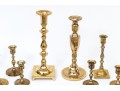 Assembled Collection Of Ten Brass Candlesticks And Candles