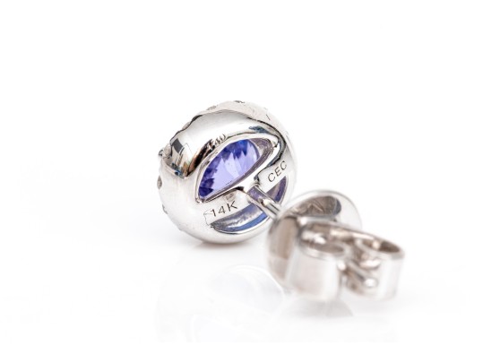 14k White Gold Beautiful Tanzanite And Diamond Halo Earrings, App. 0.83 TCW