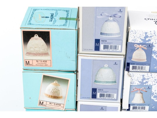Festive Collection Of Twelve Lladro Porcelain Christmas Bell Ornaments