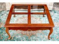 Cherry Stained Cocktail Table With Beveled Glass Panels