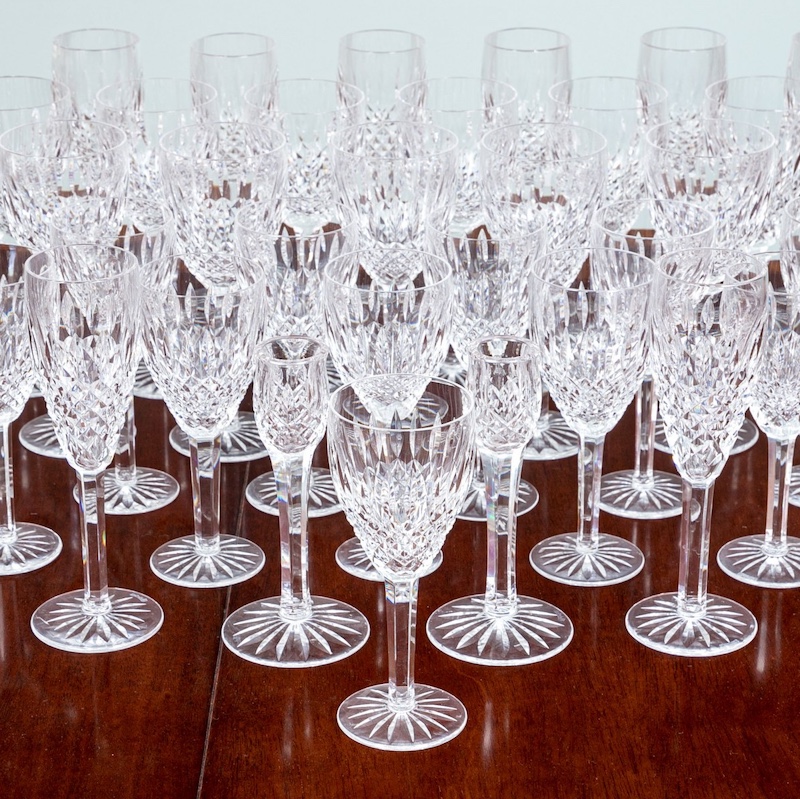 An impressive collection of Waterford Crystal stemware and candlesticks featured in a Fairfield Single Owner online auction.