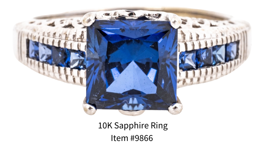 A gorgeous square faceted deep and vibrant blue sapphire (3.19 CTS) with filigree gallery and four-channel set square cut sapphires, size 9.