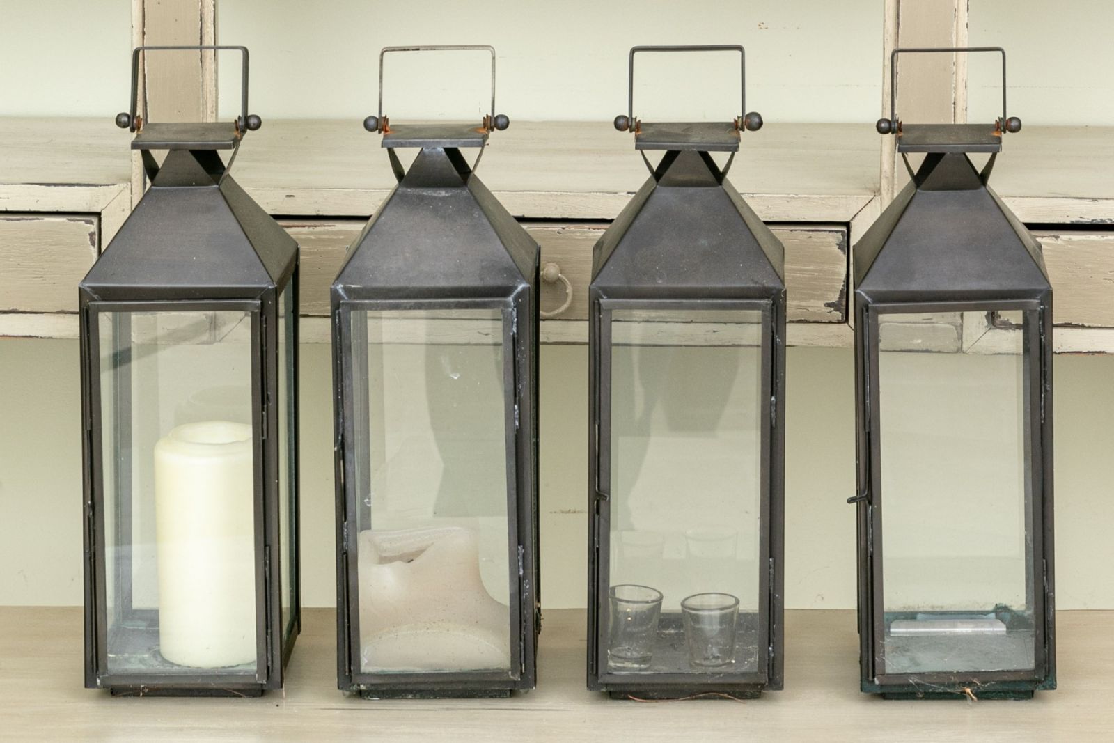 FOUR RESTORATION HARDWARE MYKONOS BRONZE FINISHED LANTERNS, 14 3/4