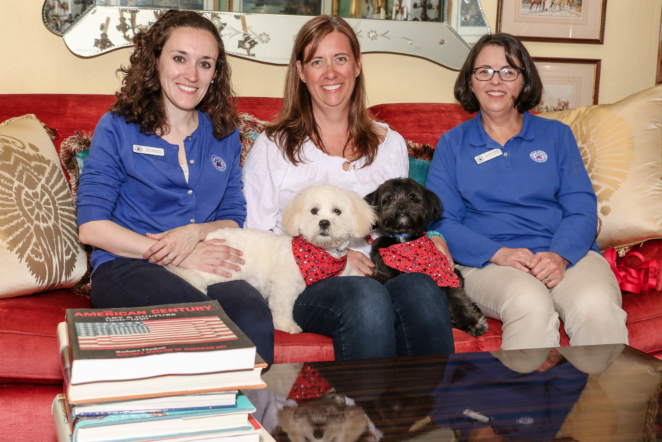 CT Humane Society Volunteers, Kerry Garofano & Barb Naugle join BRG Managing Partner, Christie Spooner with two rescue puppies, Javier & Henry