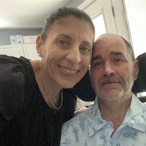 BRG’s employee, Maria, with her husband who was diagnosed with ALS several years ago.