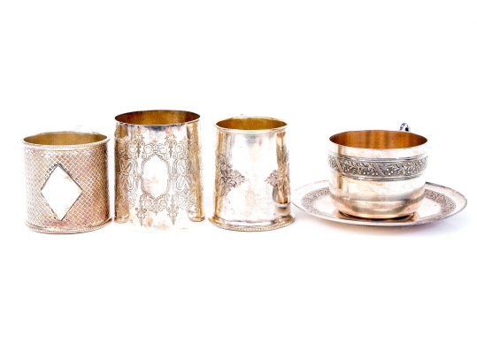 Five Piece Collection Of Silver Plated Cups, With A Saucer