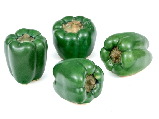 Four Naturalistic Glazed Ceramic Green Pepper Form Casters