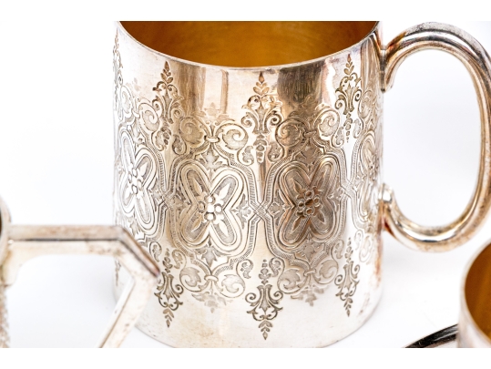Five Piece Collection Of Silver Plated Cups, With A Saucer