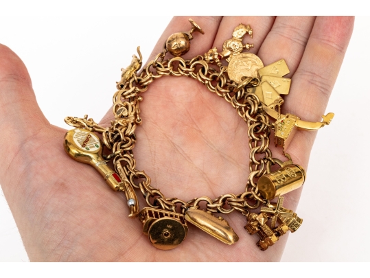14k Yellow Gold Fabulous Vintage Travel Motif Charm Bracelet, With 14k, 10k And 9k Assorted Charms