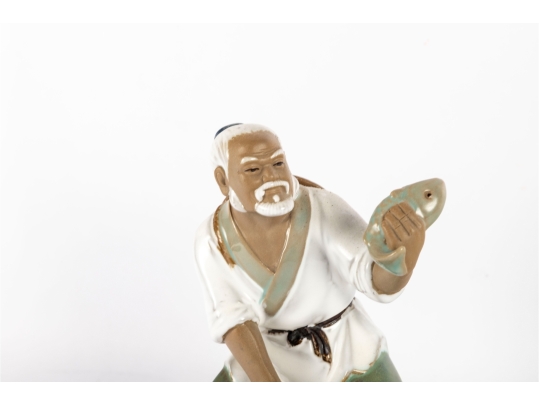 Chinese Dehua Style Porcelain Fisherman Figurine