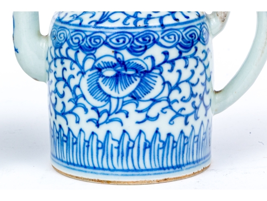Two Blue And White Porcelain Wares, Including A Lidded Kettle And Lidded Tea Caddy