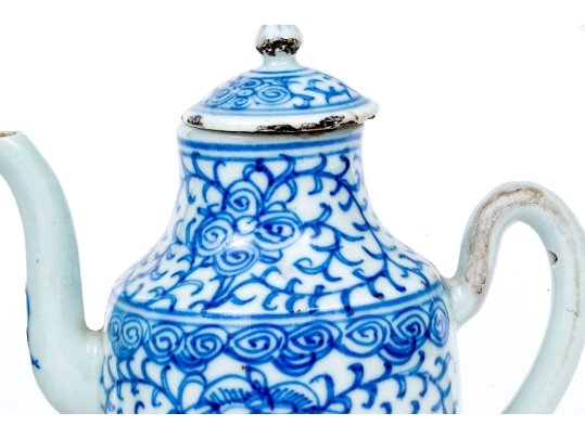 Two Blue And White Porcelain Wares, Including A Lidded Kettle And Lidded Tea Caddy