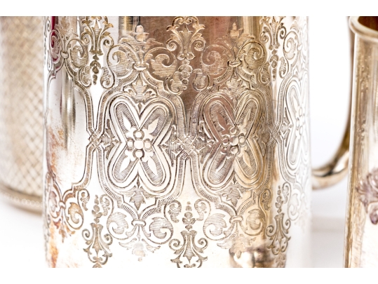Five Piece Collection Of Silver Plated Cups, With A Saucer