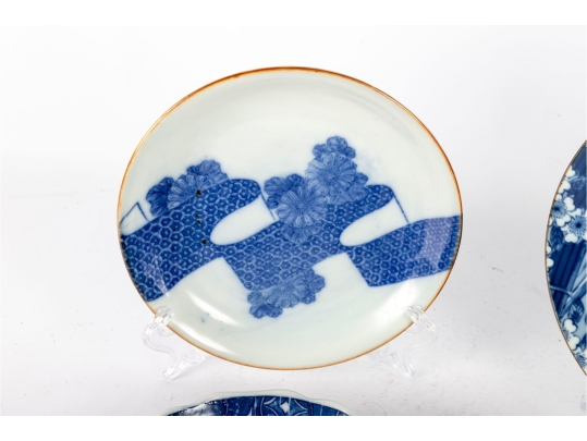 Group Of Four Blue And White Porcelain Plates