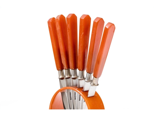 Four Vintage Bakalite Mounted Flatware Sets