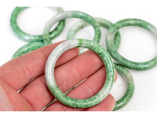 Collection Of Eight Carved Jadeite Napkin Rings