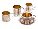 Five Piece Collection Of Silver Plated Cups, With A Saucer