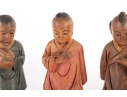 Set Of Three Hand-Carved Asian Wooden Figures