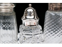 Collection Of Five Crystal And Silverplate Shakers
