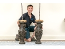 Pair Of Bronze Twin Handled Vases With Topiaries