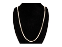Vintage Opera Length Strand Of 5.5mm To 5.75mm Cultured Pearls, With 14k Fishhook Clasp
