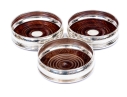 Set Of Three English Silverplate Wine Bottle Coasters