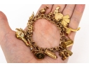 14k Yellow Gold Fabulous Vintage Travel Motif Charm Bracelet, With 14k, 10k And 9k Assorted Charms