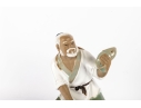 Chinese Dehua Style Porcelain Fisherman Figurine