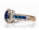14k White Gold Oval And Calibre Sapphire And Diamond Halo Ring, App. 0.15 TCW, Size 7