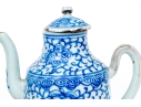 Two Blue And White Porcelain Wares, Including A Lidded Kettle And Lidded Tea Caddy