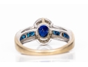 14k White Gold Oval And Calibre Sapphire And Diamond Halo Ring, App. 0.15 TCW, Size 7