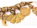 14k Yellow Gold Fabulous Vintage Travel Motif Charm Bracelet, With 14k, 10k And 9k Assorted Charms