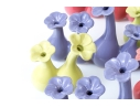 Collection Of Twelve Ceramic Floral Form Bud Vases
