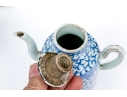 Two Blue And White Porcelain Wares, Including A Lidded Kettle And Lidded Tea Caddy