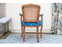 Carved Fruitwood And Cane Back Fauteuil
