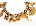 14k Yellow Gold Fabulous Vintage Travel Motif Charm Bracelet, With 14k, 10k And 9k Assorted Charms