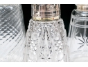 Collection Of Five Crystal And Silverplate Shakers