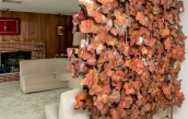 Large Copper Sculpture as room divider by Thomas W. Astle creates a backdrop for their living room's seating area.  | BRG