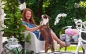 Alison Sheffield and her dog seated in her garden patio.  | BRG