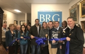 Grant, Christie, & Michael of BRG surrounded by local chambers of commerce members  | BRG